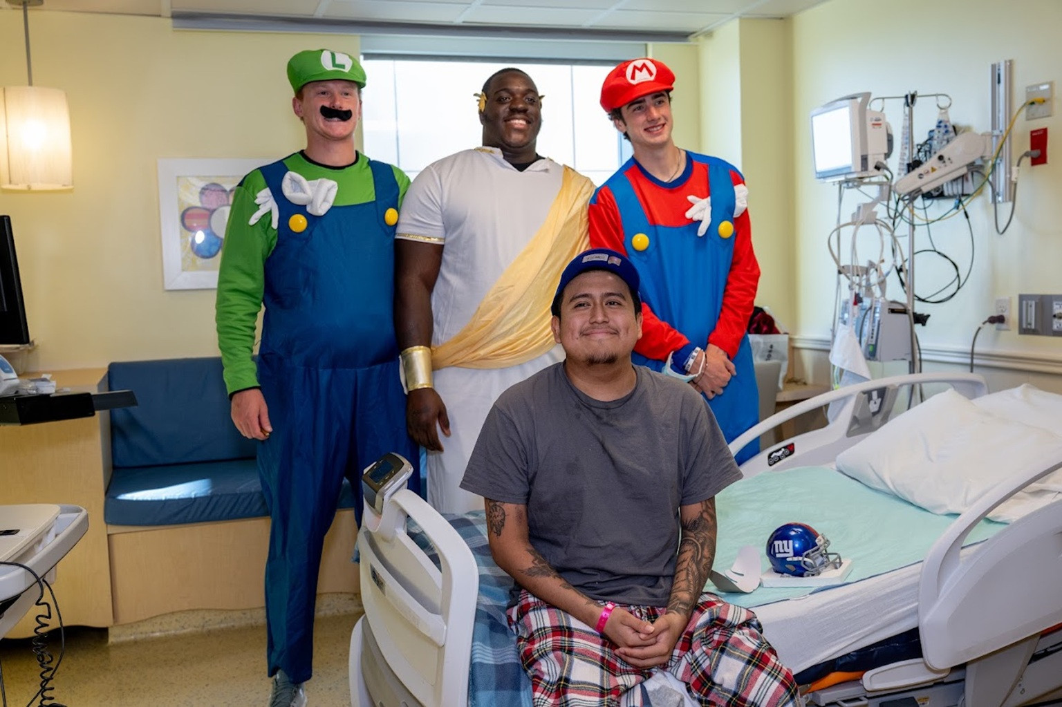 Giants rookies swap playbooks for trick-or-treat bags in heartwarming hospital visit